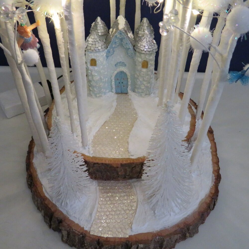 Fairy Castle in a Snowy Winter Forest on live edge wood planks
